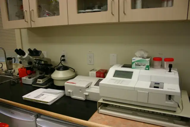 Microscopes and diagnostic equipment inside a zoo veterinary laboratory